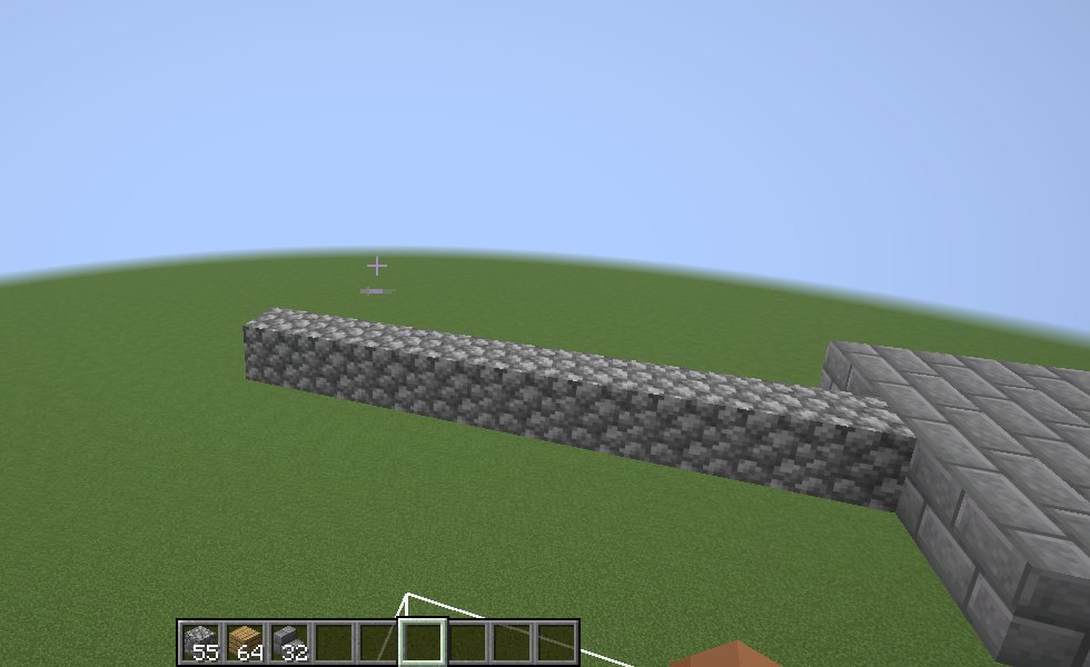 Side view of a straight cobblestone bridge extending from a stone brick platform high above the ground.